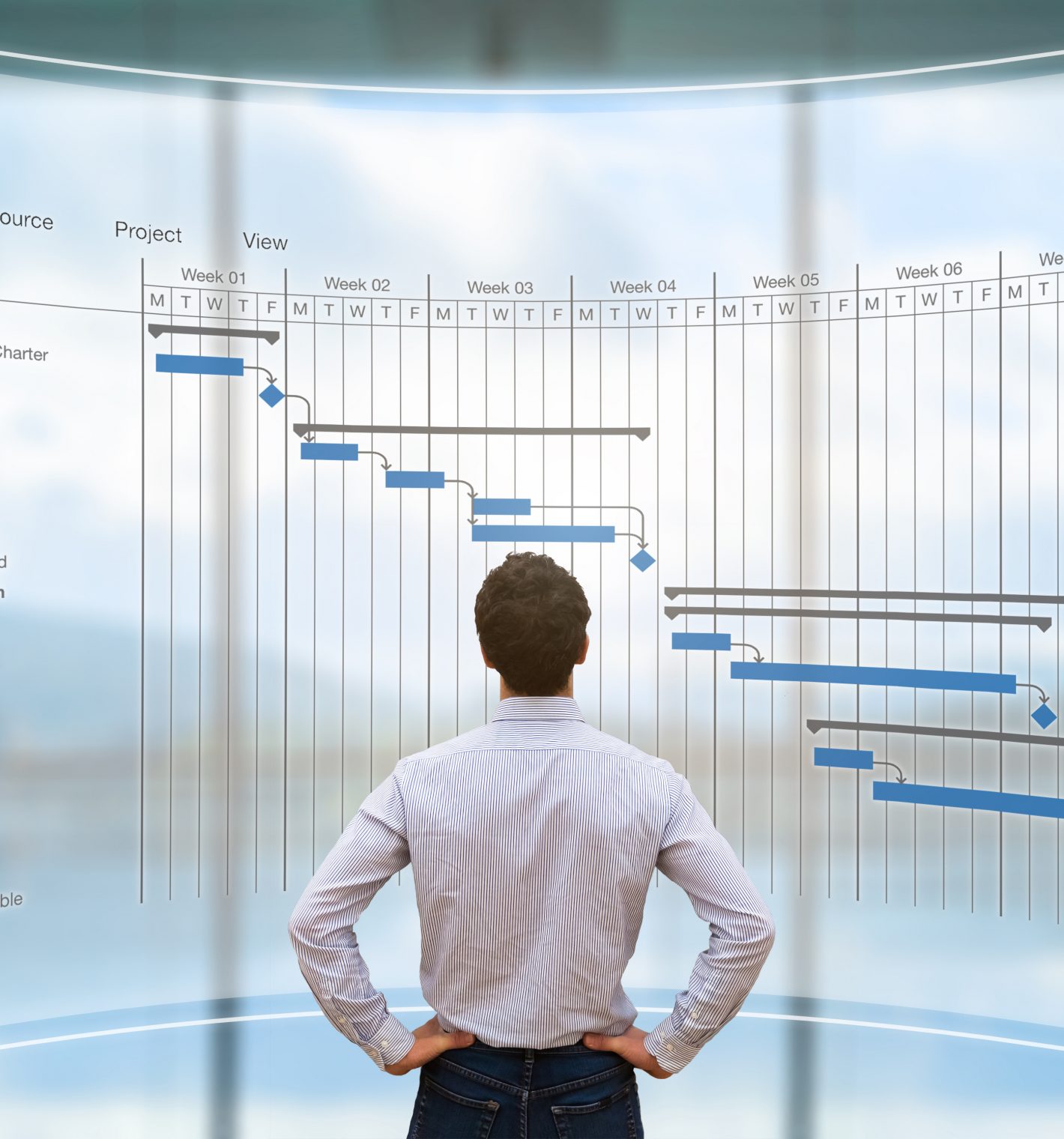 Project manager looking at AR screen with Gantt chart schedule or planning showing tasks and deadlines